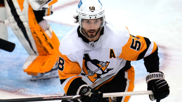 Pittsburgh Penguins’ Kris Letang skates during the third period of an NHL hockey game against the Buffalo Sabres in Pittsburgh, Saturday, Dec. 10, 2022. (AP Photo/Gene J. Puskar)